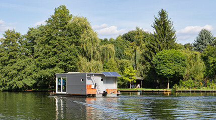 with the houseboat on the river Dahme in Brandenburg. relaxed sailing with the boat.