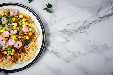 Healthy whole grain linguine with shrimps, asparagus, cherry tomatoes, fresh Parmesan cheese, and oregano.