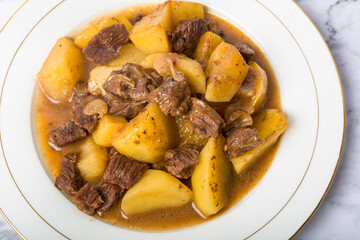 A pot of braised potato beef brisket
