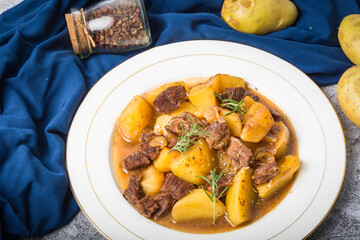 A pot of braised potato beef brisket