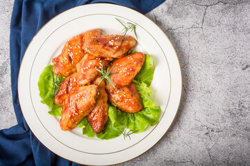 A plate of Orleans grilled chicken wings