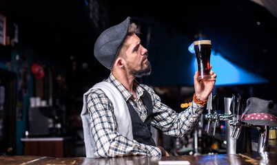 Barman formulates a cocktail in the porterhouse