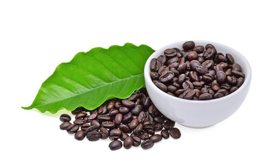 Bowl with coffee beans and coffee leaf on white background.