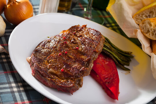 Grilled beef with stewed green beans and pepper. High quality photo
