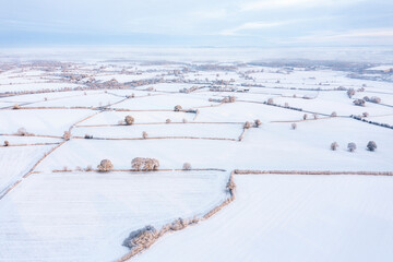 UK, England, Lichfield, Aerial view of snow-covered fields