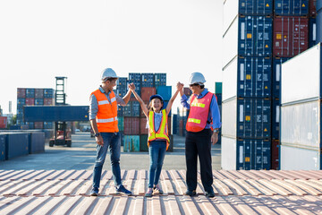 Business heir concept. Grandfather,  Father and daughter are standing in Container cargo harbor. They are happy together  because of successful  into container for loading - obrazy, fototapety, plakaty