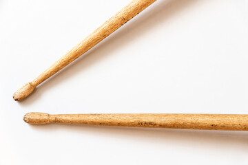 Pioneer red snare drum and wooden drumsticks.