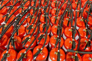A lot of fire extinguishers. Protection and security in case of fire. Abstract background. - 474660007