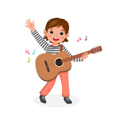 little girl playing guitar and singing waving hand with smiling facial expression