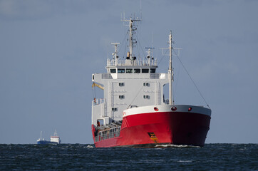 MERCHANT VESSEL - Red ship on a cruise at sea