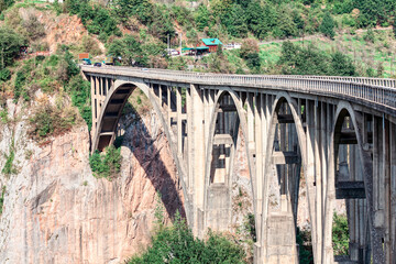 Bridge on Tara , popular attraction in Montenegro . Largest reinforced concrete road bridge in Europe