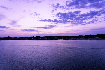Fototapeta premium Scenic purple sunrise over the Sebastian River in Little Hollywood, Micco, Florida