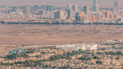 Fototapeta premium Aerial view of Jumeirah Village Circle district timelapse