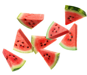 Slices of delicious ripe watermelon falling on white background