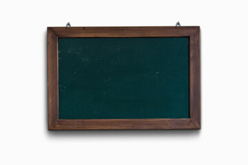 Empty green chalkboard with wooden frame on white background.