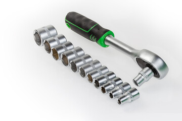 Ratchet wrench and set of hexagonal sockets different sizes