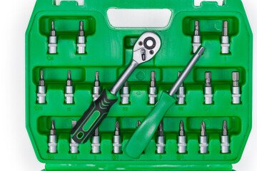 Fototapeta premium Screwdriver and ratchet handle with set of bits, top view