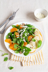 Spinach and quinoa salad with pears, oranges and ricotta. Healthy Meal prep. Plant-based dishes. Green living. Vegan recipe. Food styling. Vegetarian cuisine. Healthy eating. Weight loss food.