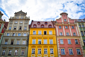 Fototapeta na wymiar krakow city green house, yellow house and pink house