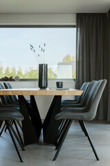 Stylish composition of elegant dining room interior design with velvet armchairs, design rectangle wooden table and beautiful personal accessories. Modern interior design inspiration. Template.