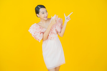 Portrait beautiful young asian woman smile with action