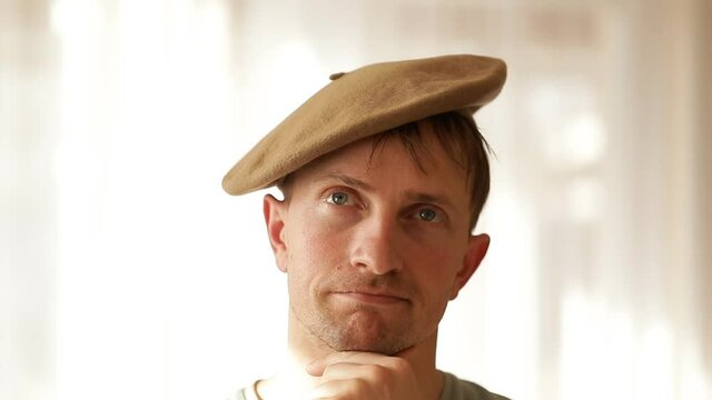 Man hat. Home concept. Video. Happy man. Smile. Emotion. Fun. 