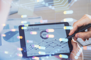 Multi exposure of man's hands holding and using a digital device and data theme drawing. Innovation concept.