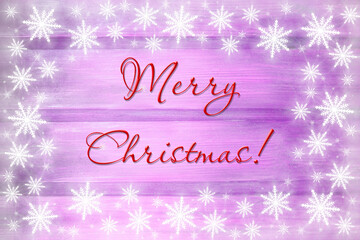 Winter wooden magenta purple lilac nature background with snowflakes around. Texture of painted wood horizontal boards. Merry Christmas card.