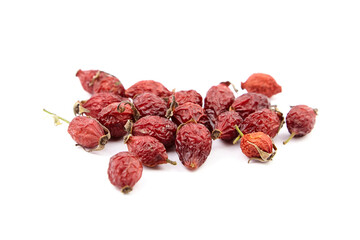 Dried rose hip berries isolated on white