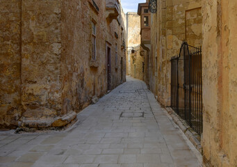 Fototapeta na wymiar narrow stone street in the old city