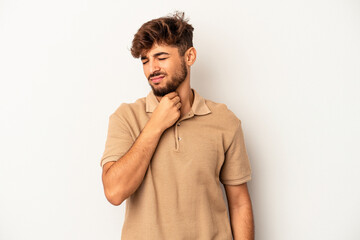 Young mixed race man isolated on grey background suffers pain in throat due a virus or infection.