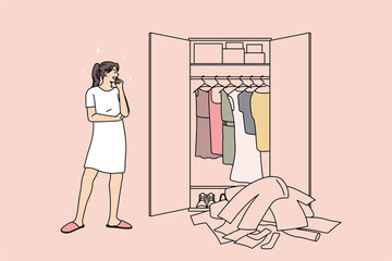 Huge wardrobe and problem of choice concept. Young smiling girl standing looking at wardrobe with many colorful clothes and trying to choose something to wear vector illustration 