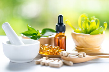 Alternative medicine nature herbal organic capsule, drug with herbs leaf natural supplements for healthy good life.