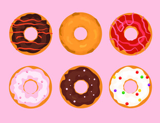 A set of colorful donuts on a pink background