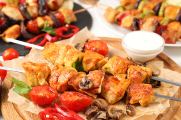 Concept of tasty food with chicken shashlik on white background