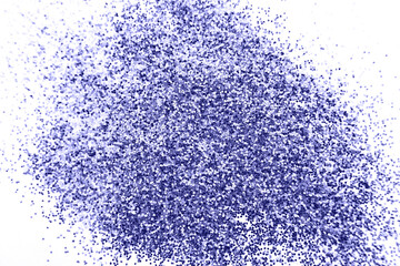glittering background of purple sequins isolated on a white background closeup.