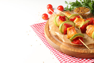 Concept of tasty food with chicken shashlik on white background