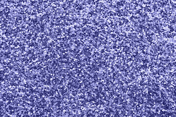 glittering background of purple sequins closeup. Sparkle festive texture