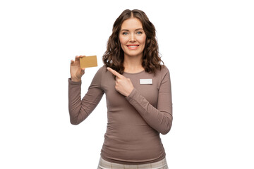sale, shopping and business concept - happy female shop assistant holding golden credit card over white background