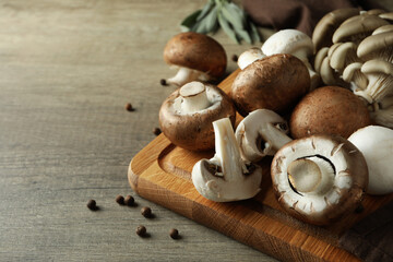 Concept of tasty food with mushrooms on wooden background