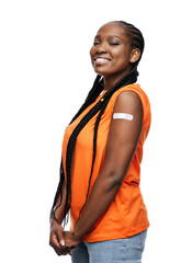 pandemic, vaccination and healthcare concept - happy young vaccinated woman with medical patch on shoulder over white background - obrazy, fototapety, plakaty