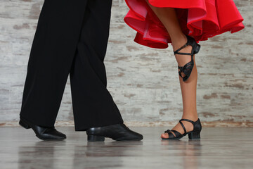Couple of kids dancing together in studio, closeup