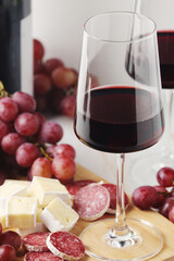Red wine in a transparent white glass	
