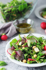Green salad with asparagus and radish