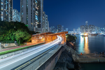 Fototapeta na wymiar Nighr scenery of harbor and highway in Hong Kong city