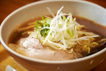 Japanese ramen, green onion topping and meat