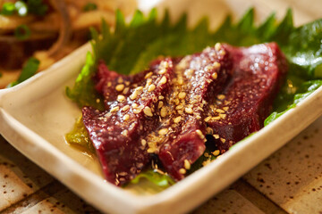 Tuna Sashimi Marinated in Sauce on a Plate
