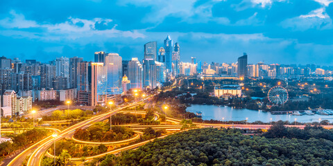 Fototapeta premium High-view night view of International Trade CBD and Binhai Overpass in Haikou, Hainan, China