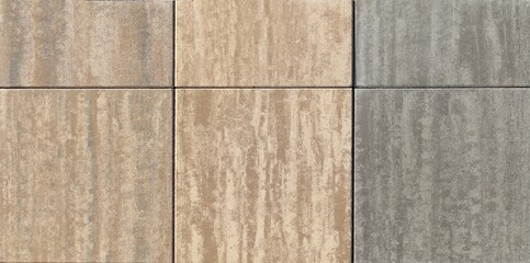 Samples of flamed stone tiles of three different colors for indoors . Background and texture, close up.