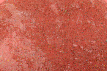 Liquid art gel background. Abstract textured coral background transparent slime with bubbles inside. Macro of kids toy slime.